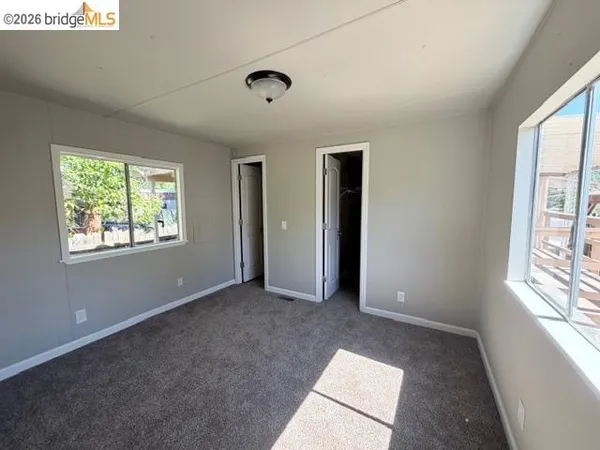 an empty room with windows