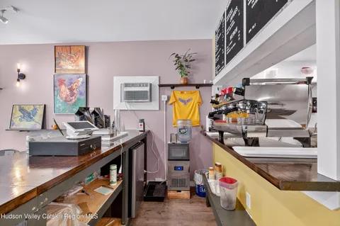 a kitchen with stainless steel appliances a sink and a stove