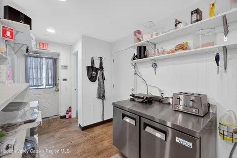 a room with a sink and cabinets