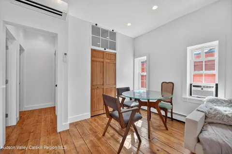 a view of a livingroom with furniture and window