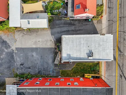 a view of a street with cars