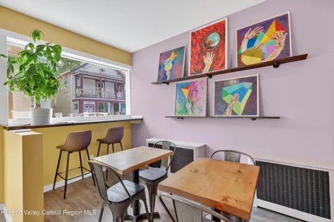 a blue table sitting next to a blue couch