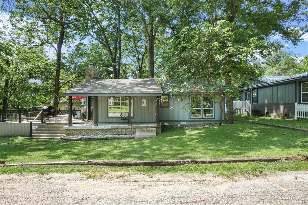 624 Apache Trail Tool, TX 75143 - Photo 6 of 21 a front view of a house with a yard