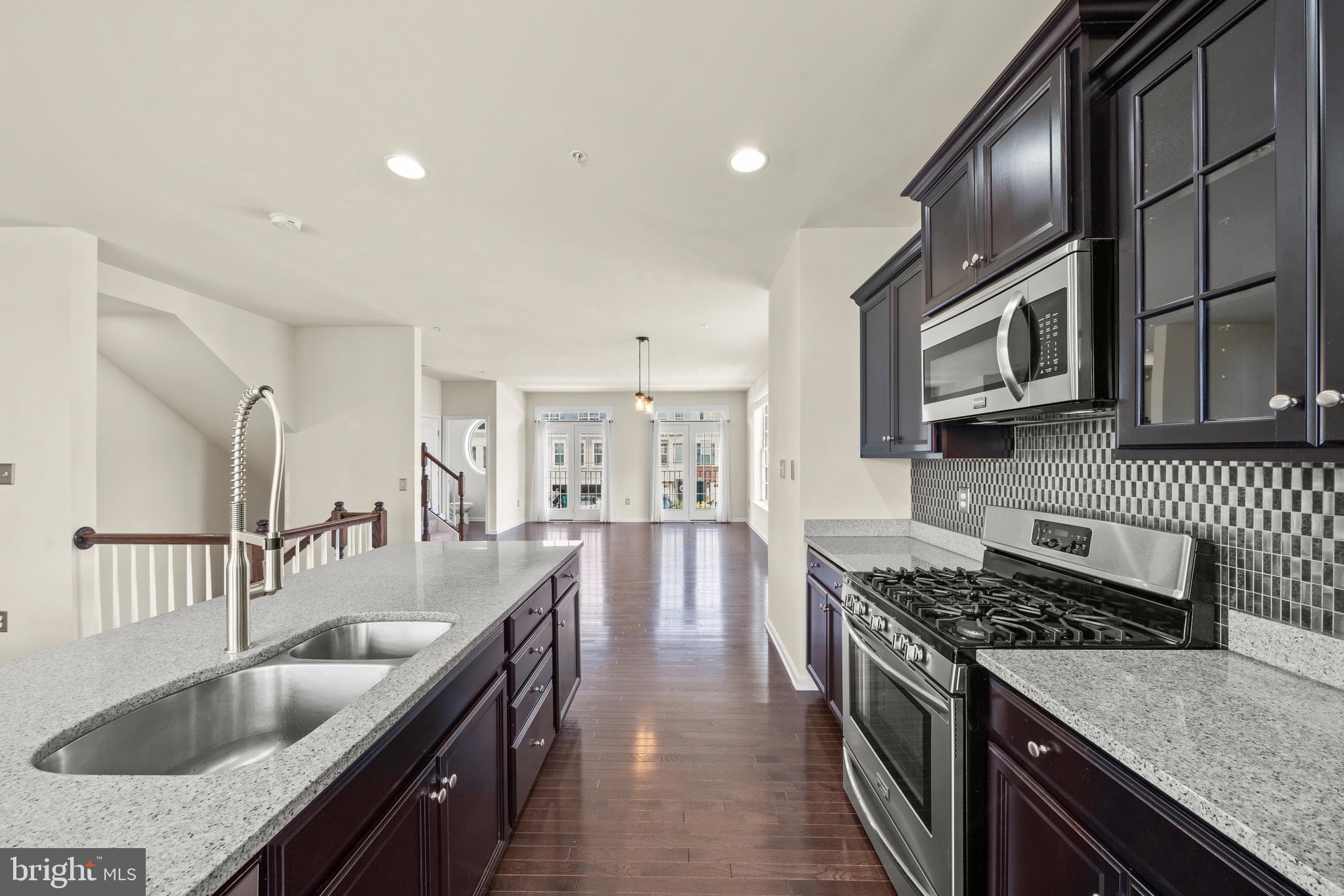 4733 Cambria Road Frederick, MD 21703 - Photo 8 of 32 Beautiful backsplash and recessed lighting