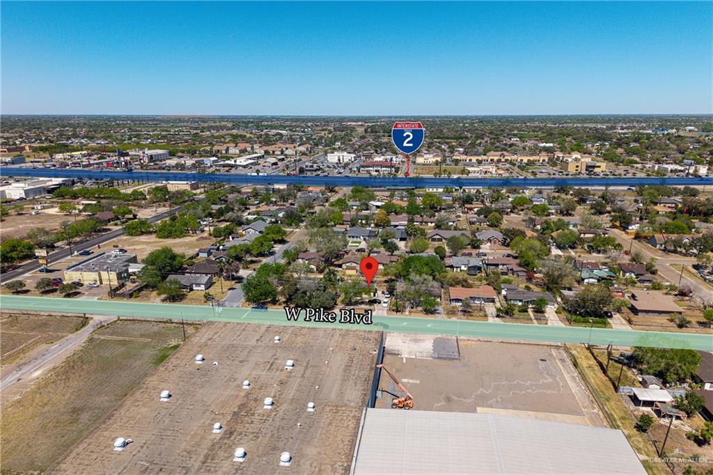 610 West Pike Boulevard Weslaco, TX 78596 - Photo 2 of 15 Aerial perspective of suburban area