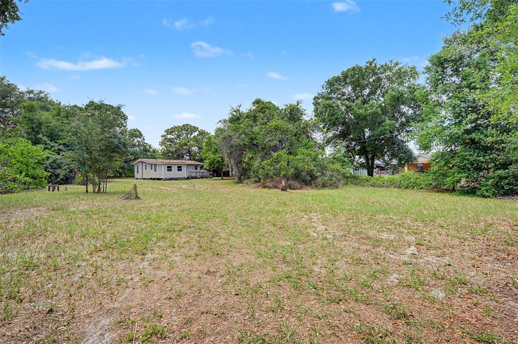Cutrone Road Winter Haven, FL 33880 - Photo 1 of 50 a view of a outdoor space and a yard