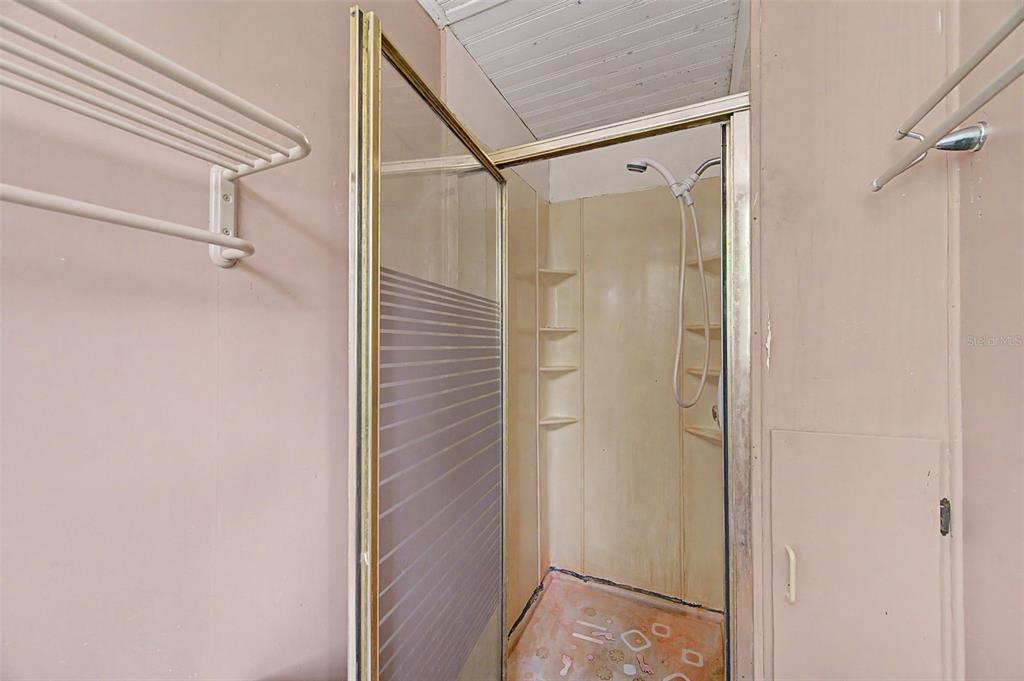 Cutrone Road Winter Haven, FL 33880 - Photo 29 of 50 a bathroom with a glass shower door