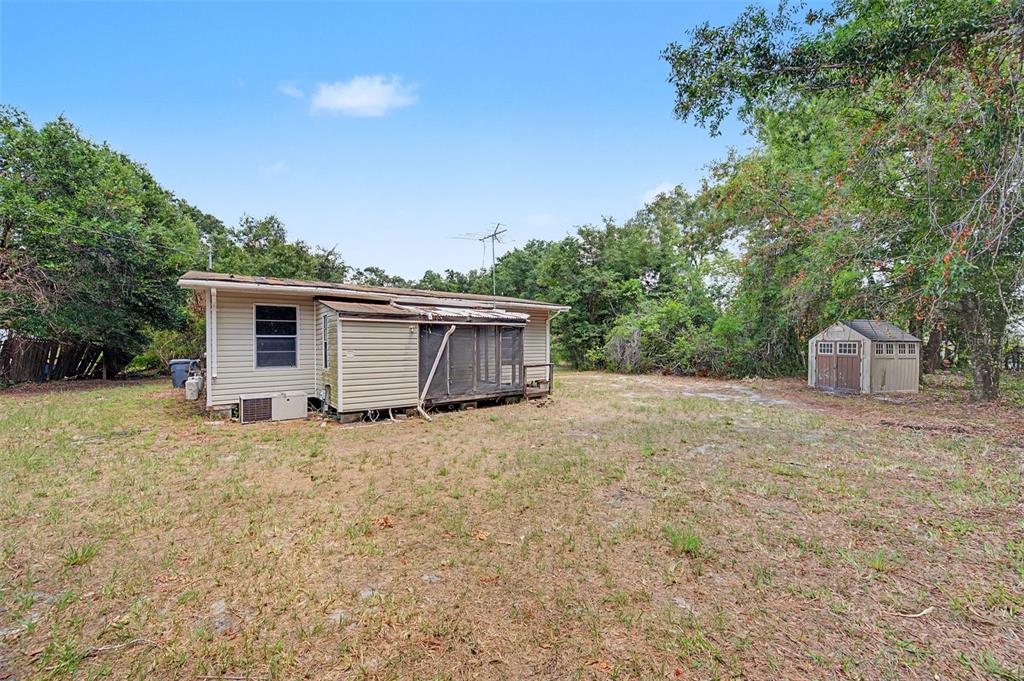 Cutrone Road Winter Haven, FL 33880 - Photo 10 of 50 a house with trees in the background