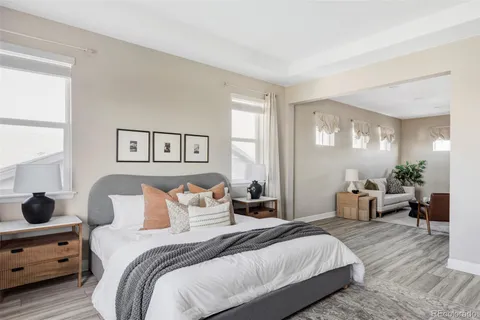 a bedroom with bed and a window