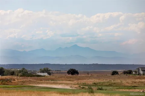 a view of ocean with mountain
