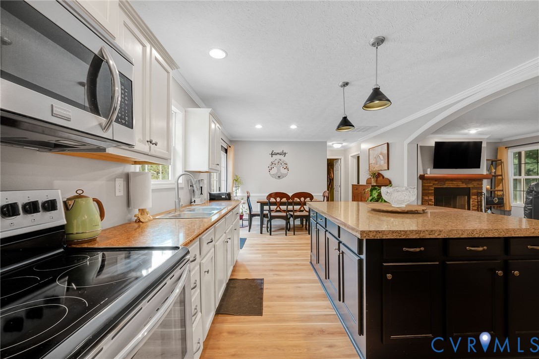 123 Riverview Road Stevensville, VA 23161 - Photo 9 of 28 Kitchen featuring light wood-finish flooring, whit