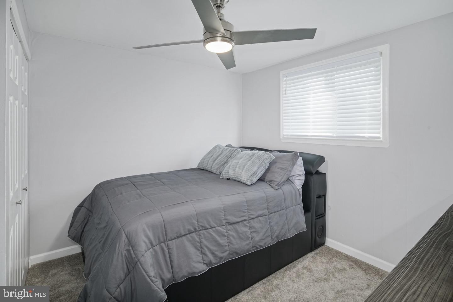 3230 Birch Road Philadelphia, PA 19154 - Photo 21 of 38 a bedroom with a bed and a window
