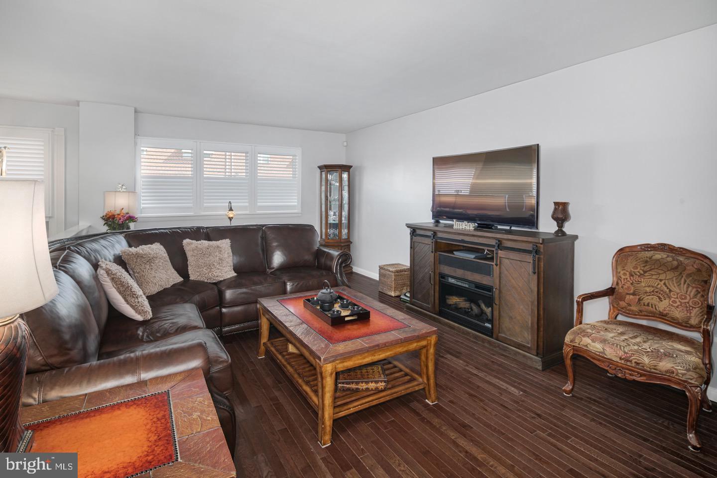 3230 Birch Road Philadelphia, PA 19154 - Photo 5 of 38 a living room with furniture and a flat screen tv