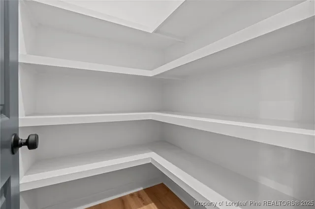 a view of a room with racks on the wall