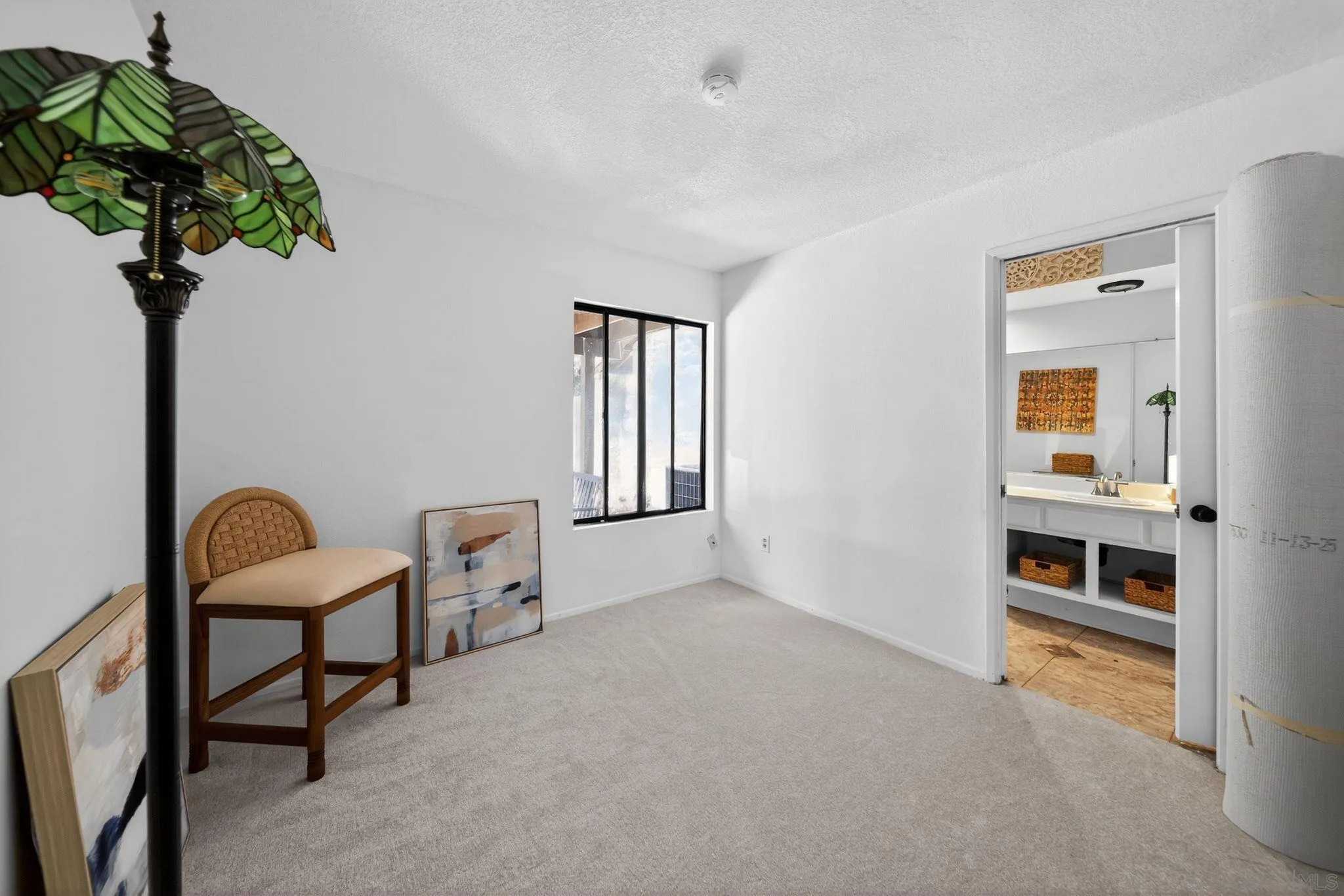 5287 Rio Plata Drive Oceanside, CA 92057 - Photo 12 of 38 a living room with furniture and a potted plant