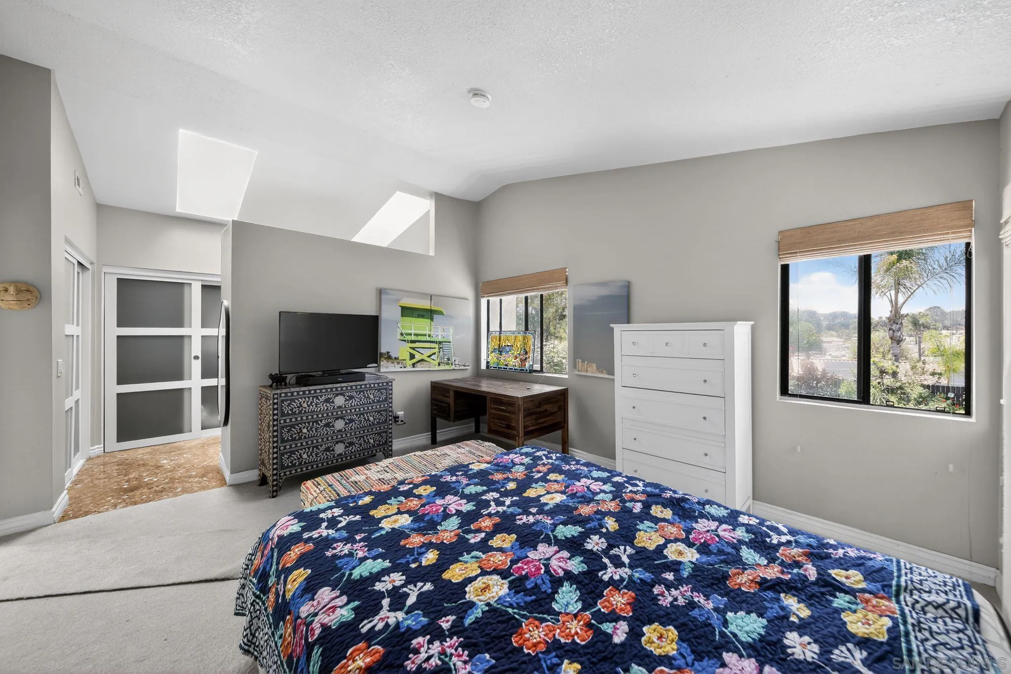 5287 Rio Plata Drive Oceanside, CA 92057 - Photo 14 of 38 a bedroom with a bed and a television