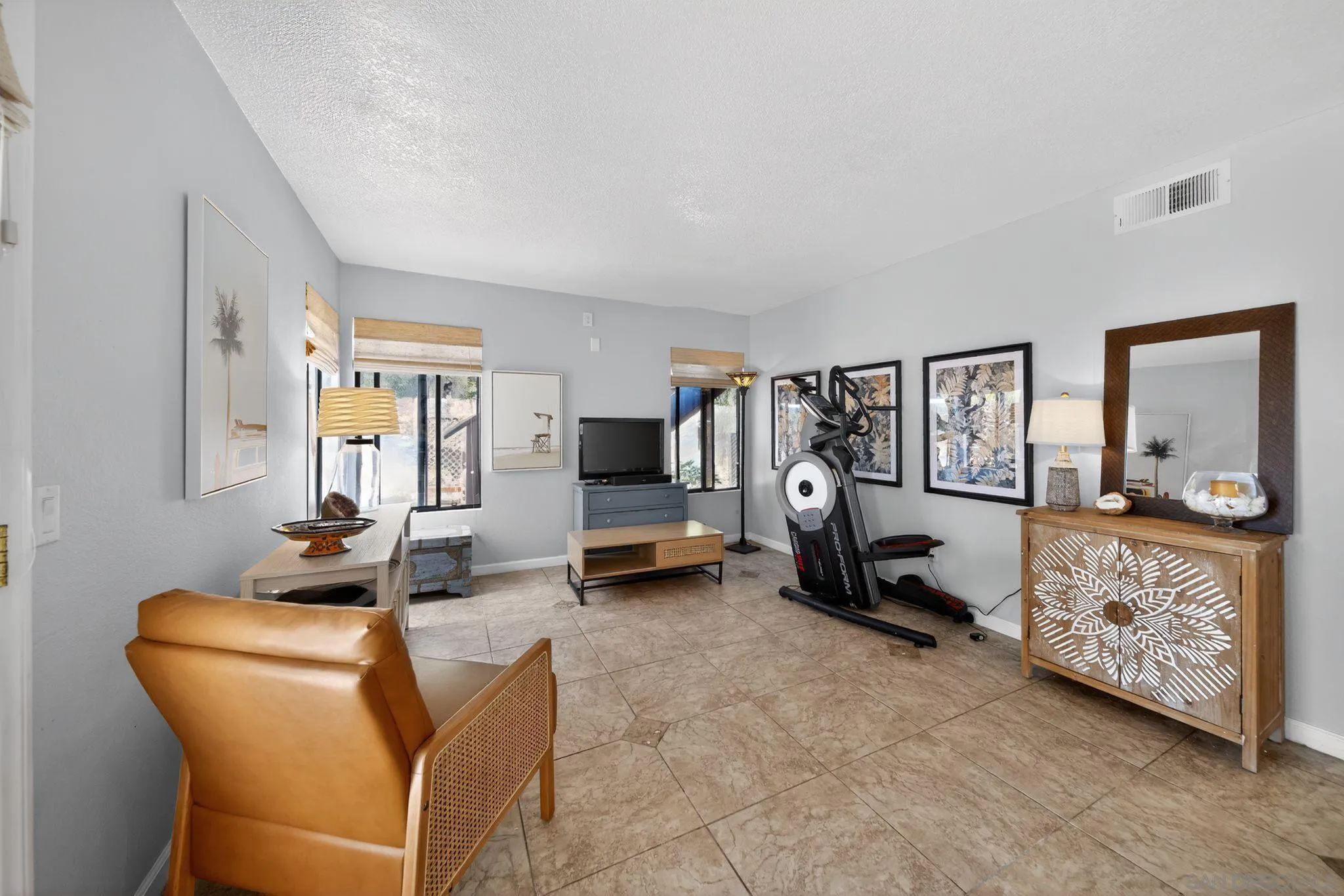 5287 Rio Plata Drive Oceanside, CA 92057 - Photo 16 of 38 a bedroom with furniture and a view of living room