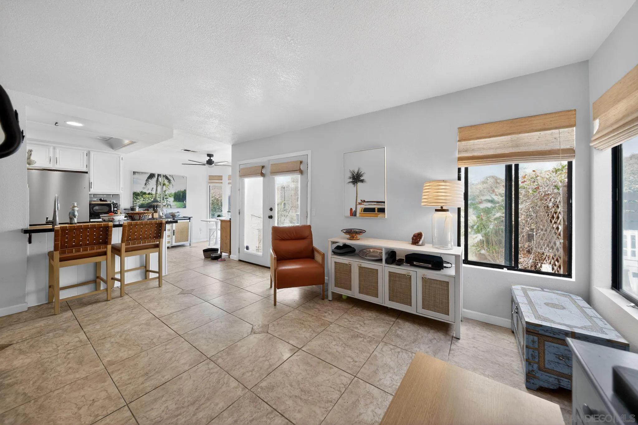 5287 Rio Plata Drive Oceanside, CA 92057 - Photo 21 of 38 a kitchen with stainless steel appliances kitchen island granite countertop a sink and cabinets