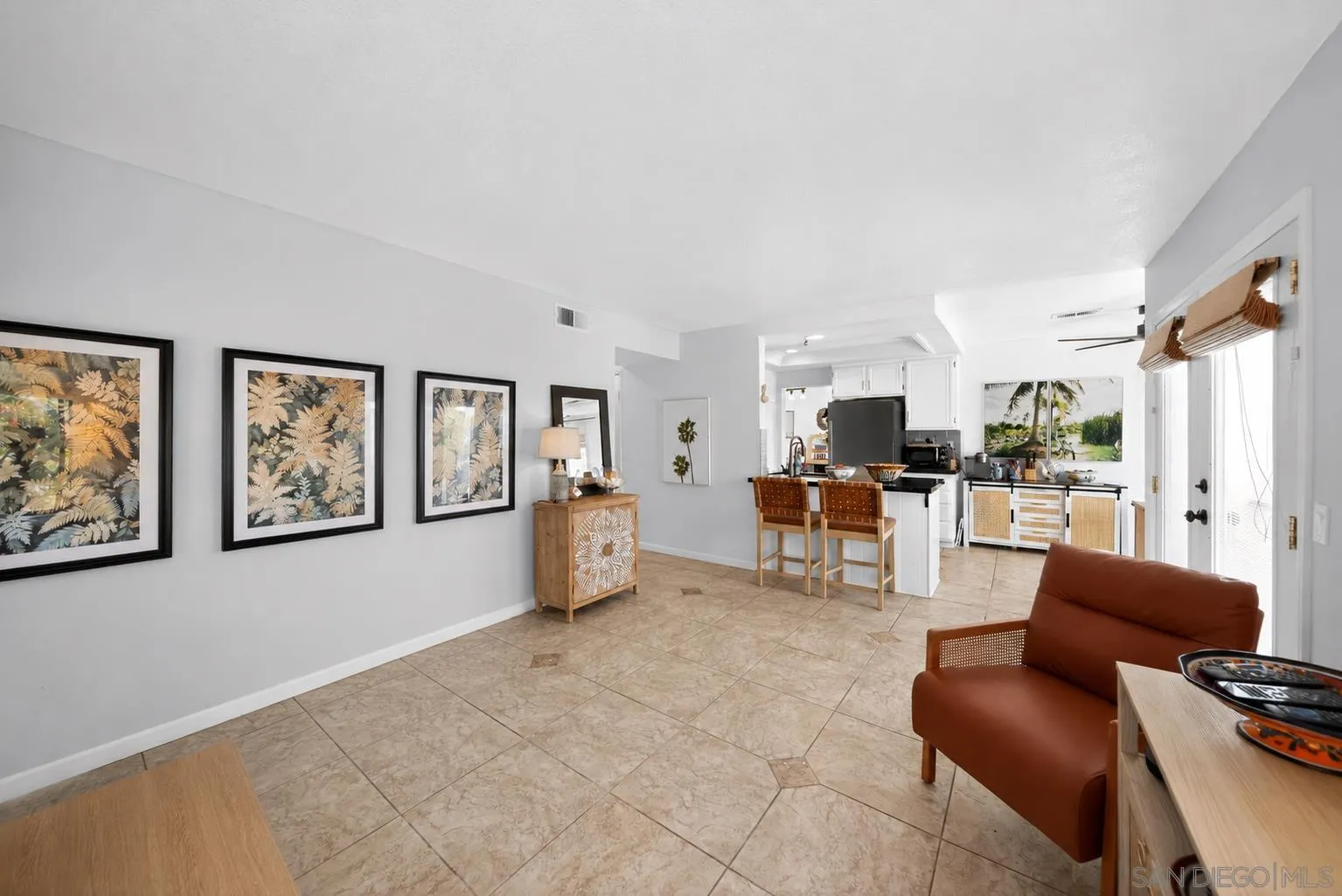 5287 Rio Plata Drive Oceanside, CA 92057 - Photo 5 of 38 a living room with furniture and kitchen view