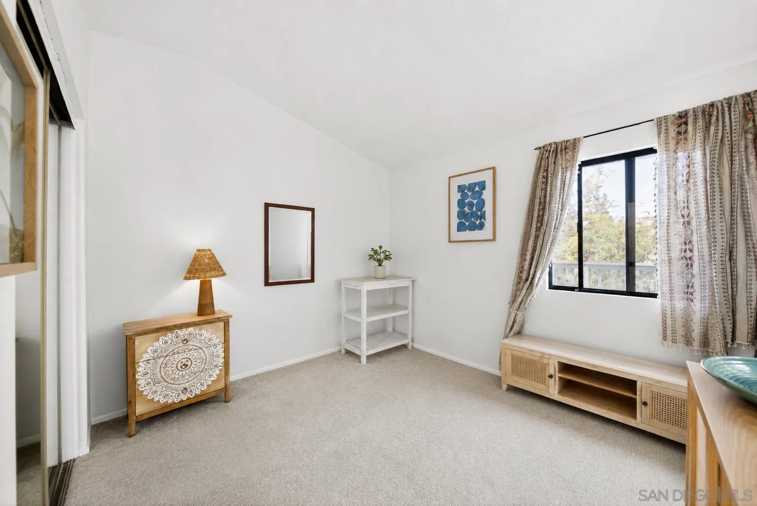 5287 Rio Plata Drive Oceanside, CA 92057 - Photo 6 of 38 a room with furniture and a window