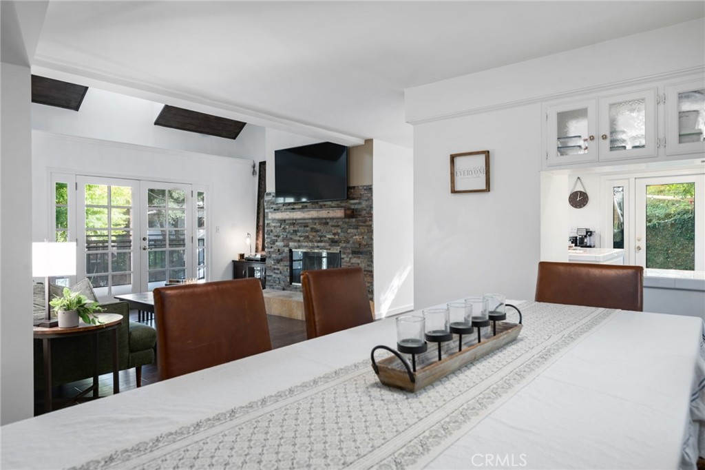 9729 Marcus Lane Tujunga, CA 91042 - Photo 15 of 55 a bedroom with furniture and a flat screen tv