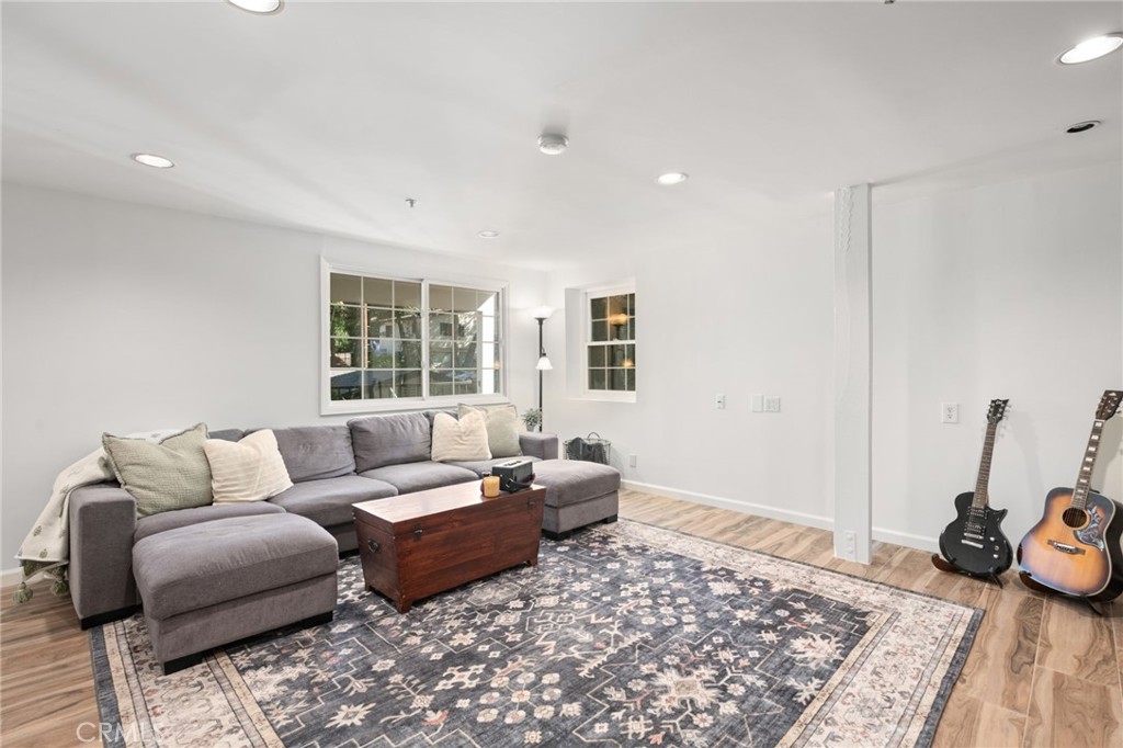 9729 Marcus Lane Tujunga, CA 91042 - Photo 26 of 55 a living room with furniture and a large window