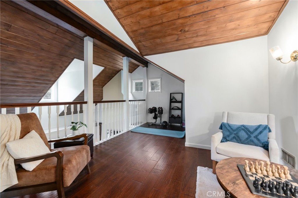 9729 Marcus Lane Tujunga, CA 91042 - Photo 37 of 55 a view of a livingroom with furniture and hardwood floor