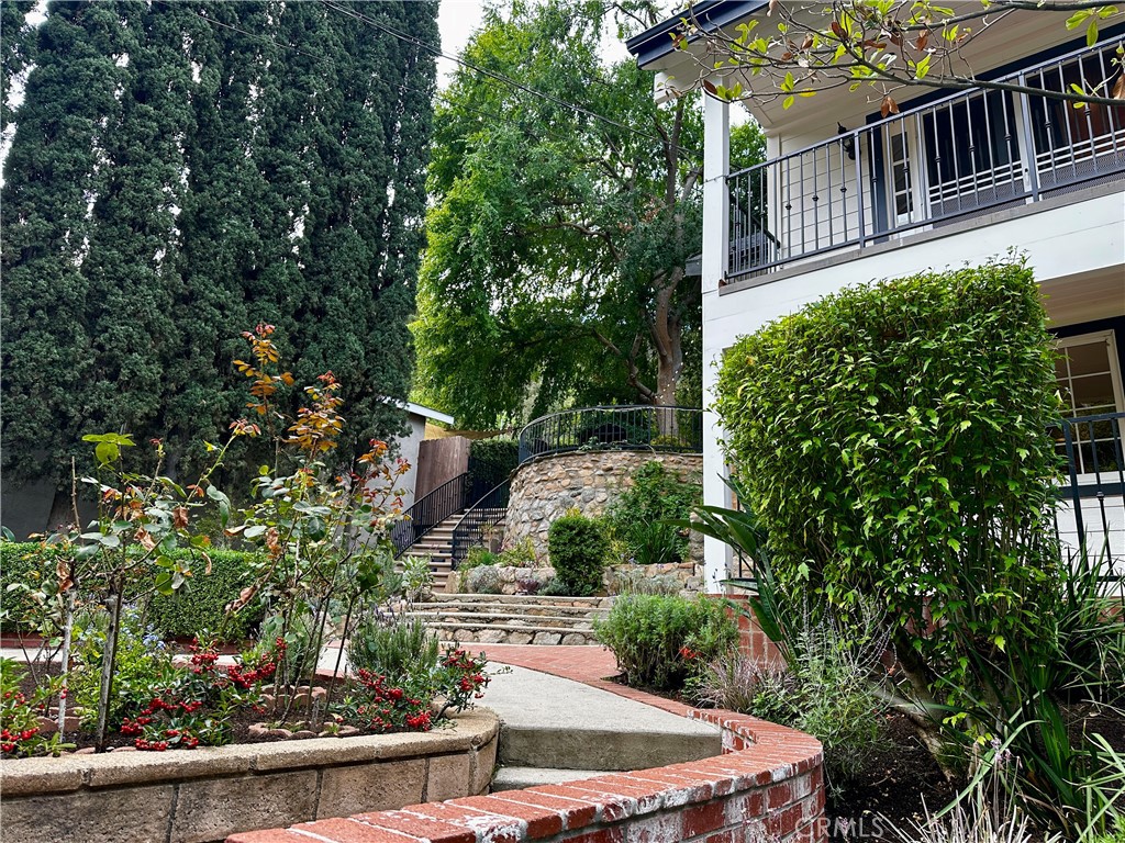 9729 Marcus Lane Tujunga, CA 91042 - Photo 4 of 55 front view of a house with a yard