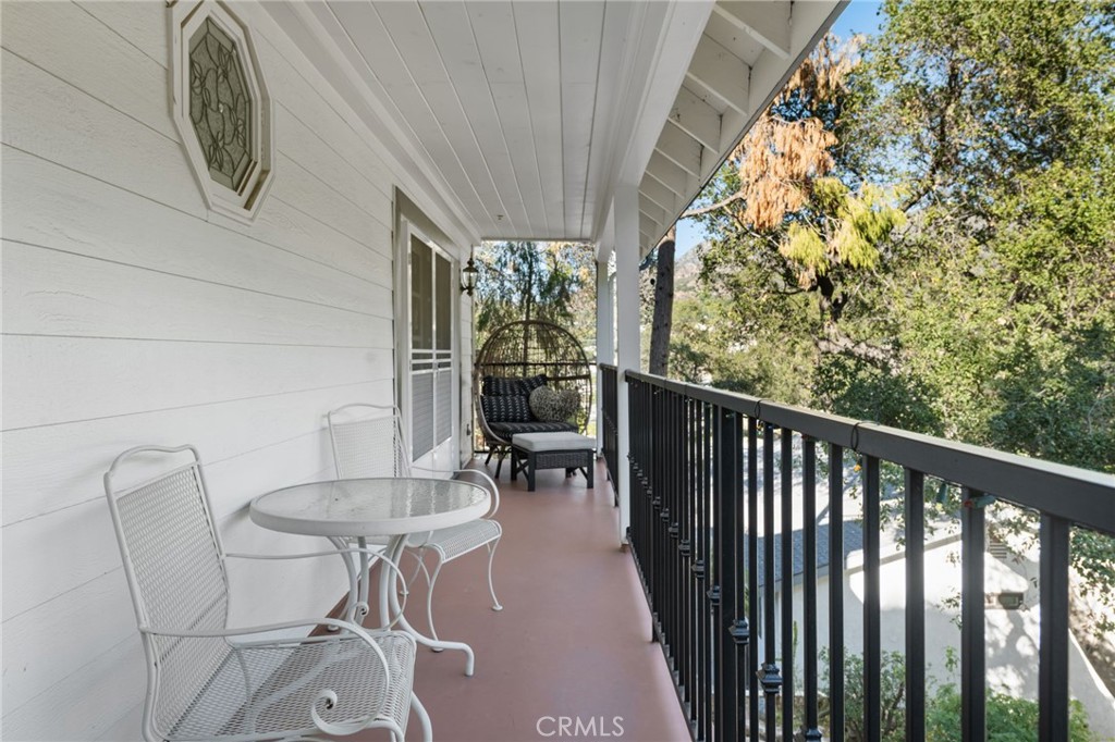 9729 Marcus Lane Tujunga, CA 91042 - Photo 43 of 55 a view of a chairs and table in the balcony