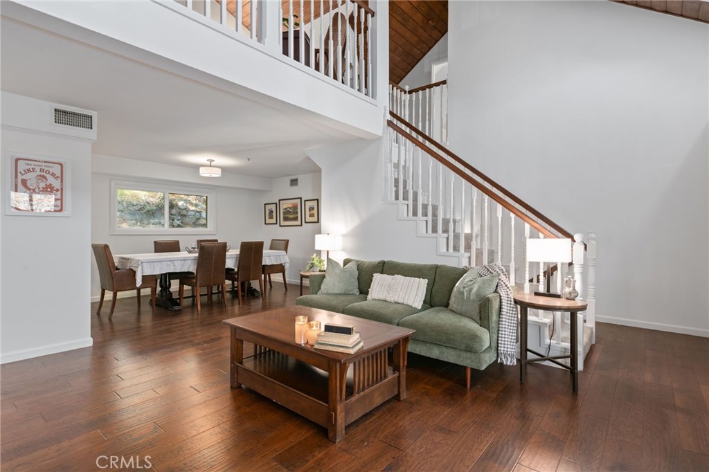 9729 Marcus Lane Tujunga, CA 91042 - Photo 8 of 55 a living room with fireplace furniture and a wooden floor
