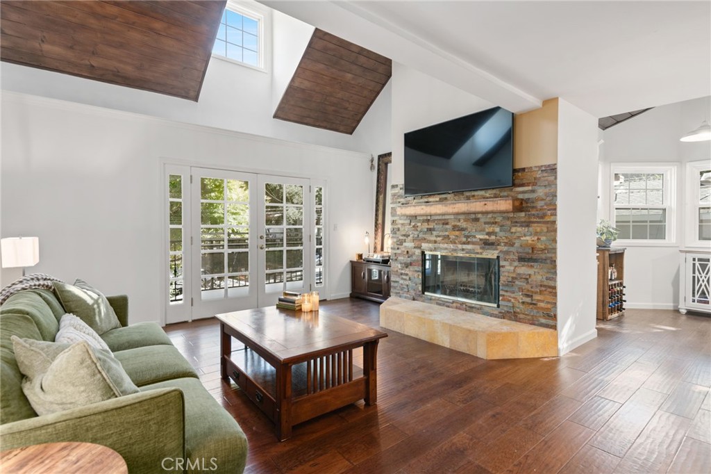 9729 Marcus Lane Tujunga, CA 91042 - Photo 10 of 55 a living room with furniture fireplace and flat screen tv