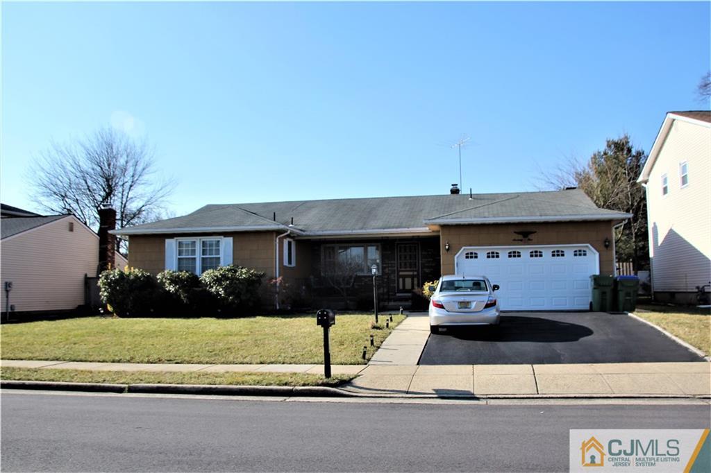 75 Rodak Circle Edison, NJ 08817 - Photo 1 of 32 a house view with a garden space