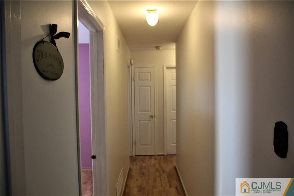 75 Rodak Circle Edison, NJ 08817 - Photo 11 of 32 a bathroom with a mirror and a shower