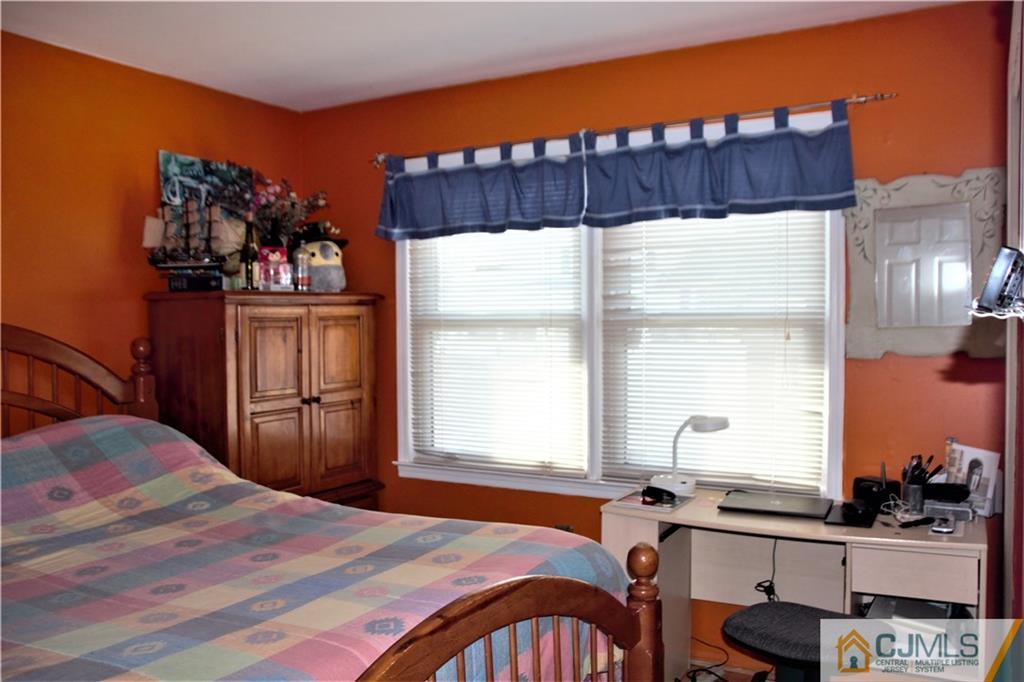 75 Rodak Circle Edison, NJ 08817 - Photo 13 of 32 a bedroom with a bed and a window