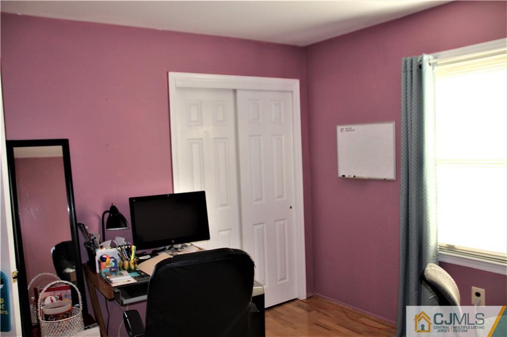 75 Rodak Circle Edison, NJ 08817 - Photo 15 of 32 a view of a workspace with furniture and a window