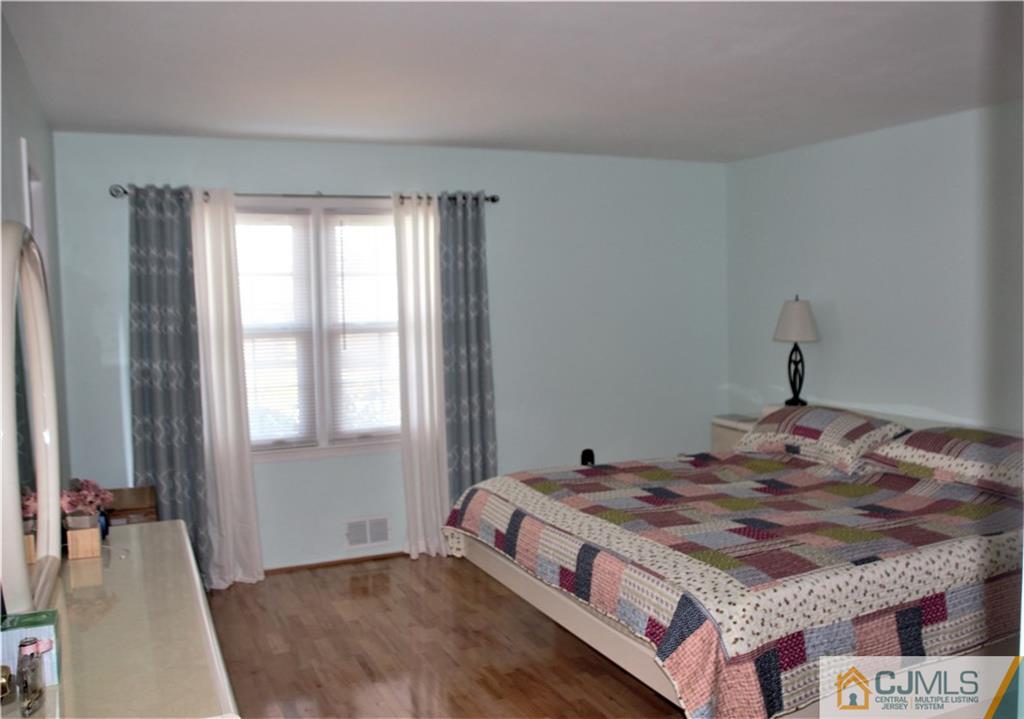 75 Rodak Circle Edison, NJ 08817 - Photo 18 of 32 a bedroom with a bed and a window