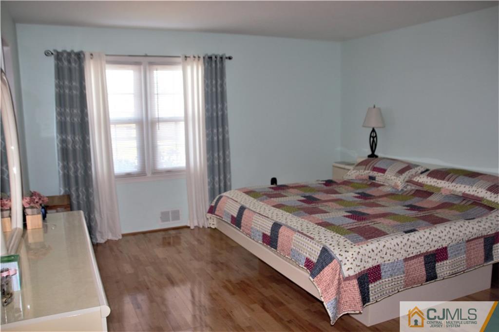 75 Rodak Circle Edison, NJ 08817 - Photo 19 of 32 a bedroom with a bed and a window