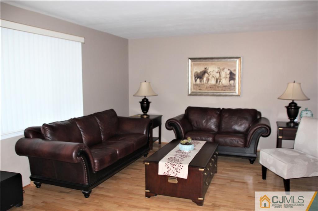 75 Rodak Circle Edison, NJ 08817 - Photo 5 of 32 a living room with furniture and a couch