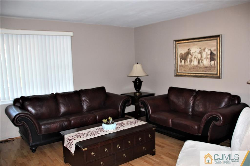 75 Rodak Circle Edison, NJ 08817 - Photo 6 of 32 a living room with furniture and a couch