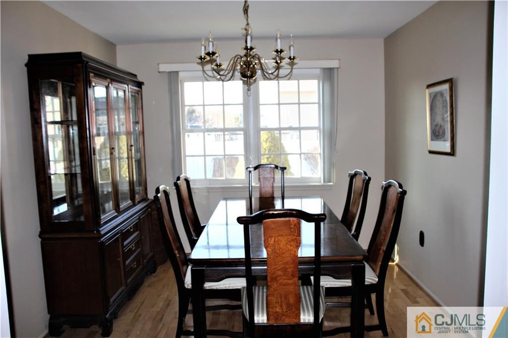 75 Rodak Circle Edison, NJ 08817 - Photo 7 of 32 a view of a dining room with furniture and window