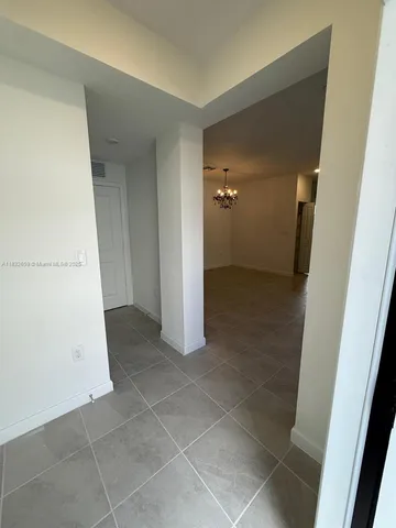 a bathroom with a sink and shower