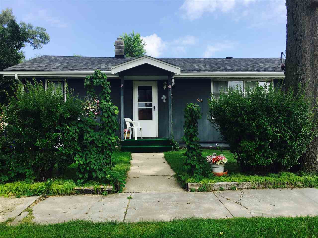 616 Barry Road Rockford, IL 61109 - Photo 1 of 15 a front view of a house with a yard