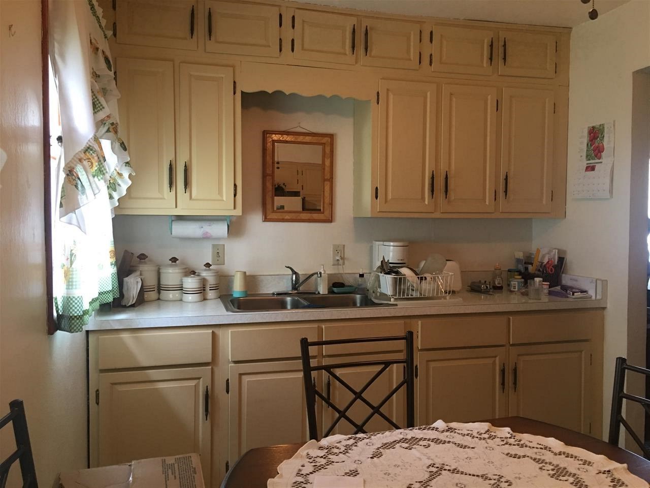 616 Barry Road Rockford, IL 61109 - Photo 4 of 15 a kitchen with a sink a stove and cabinets