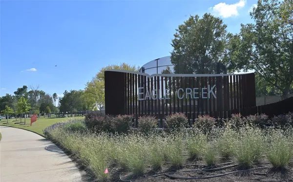 a view of a garden with pathway