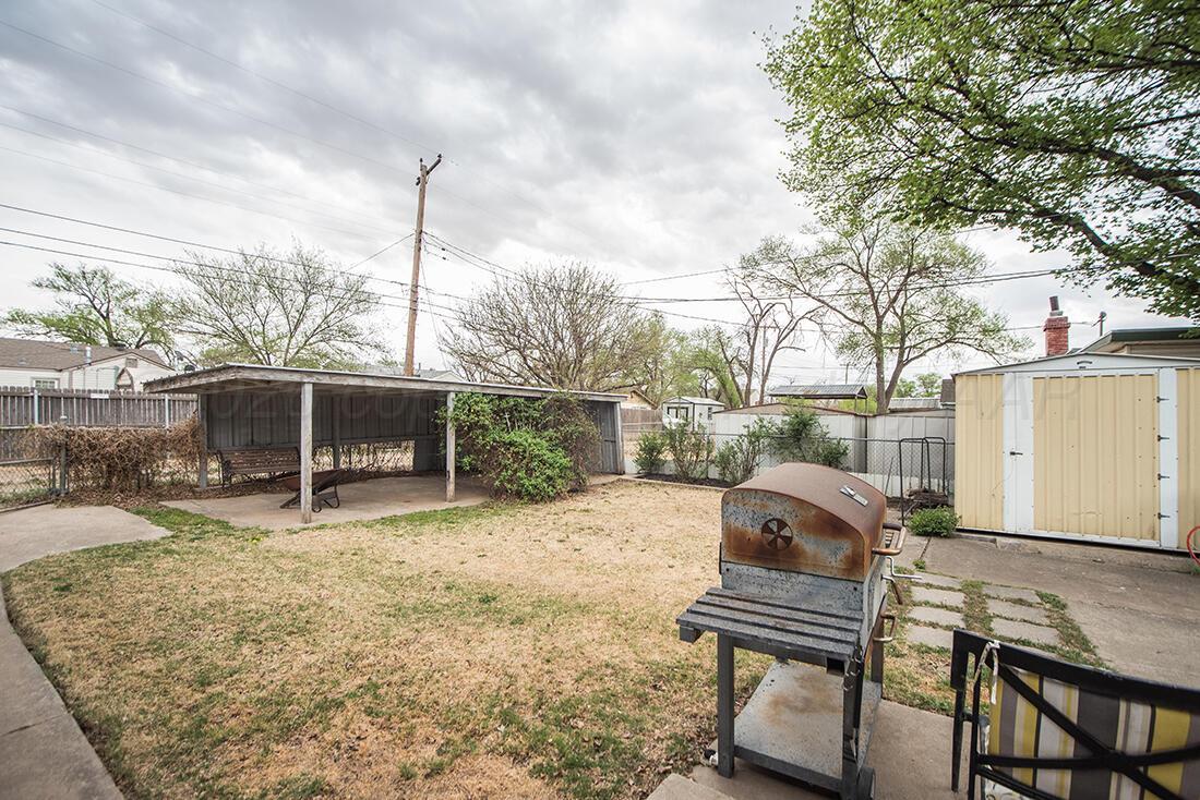 4309 South Ong Street Amarillo, TX 79110 - Photo 25 of 25 Backyard with covered space