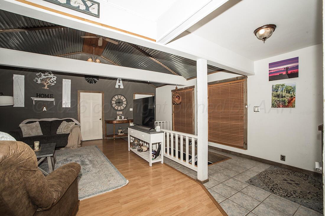 4309 South Ong Street Amarillo, TX 79110 - Photo 10 of 25 Living/Basement stairs