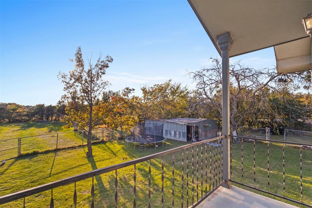 1108 Blackland Road Fate, TX 75189 - Photo 22 of 28 a view of a balcony with lake view