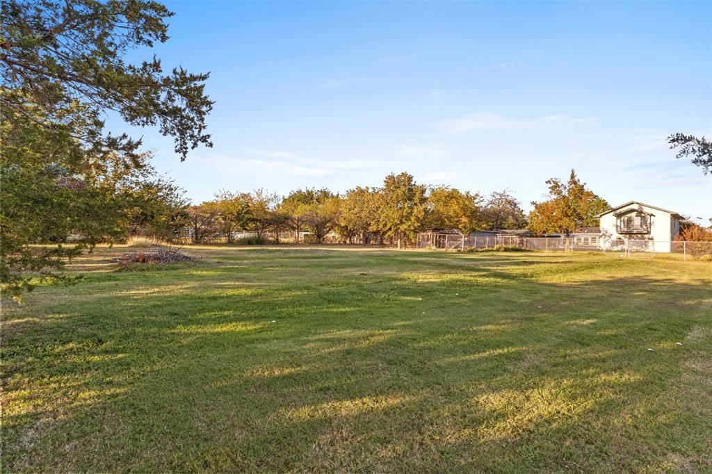 1108 Blackland Road Fate, TX 75189 - Photo 26 of 28 a view of a green field