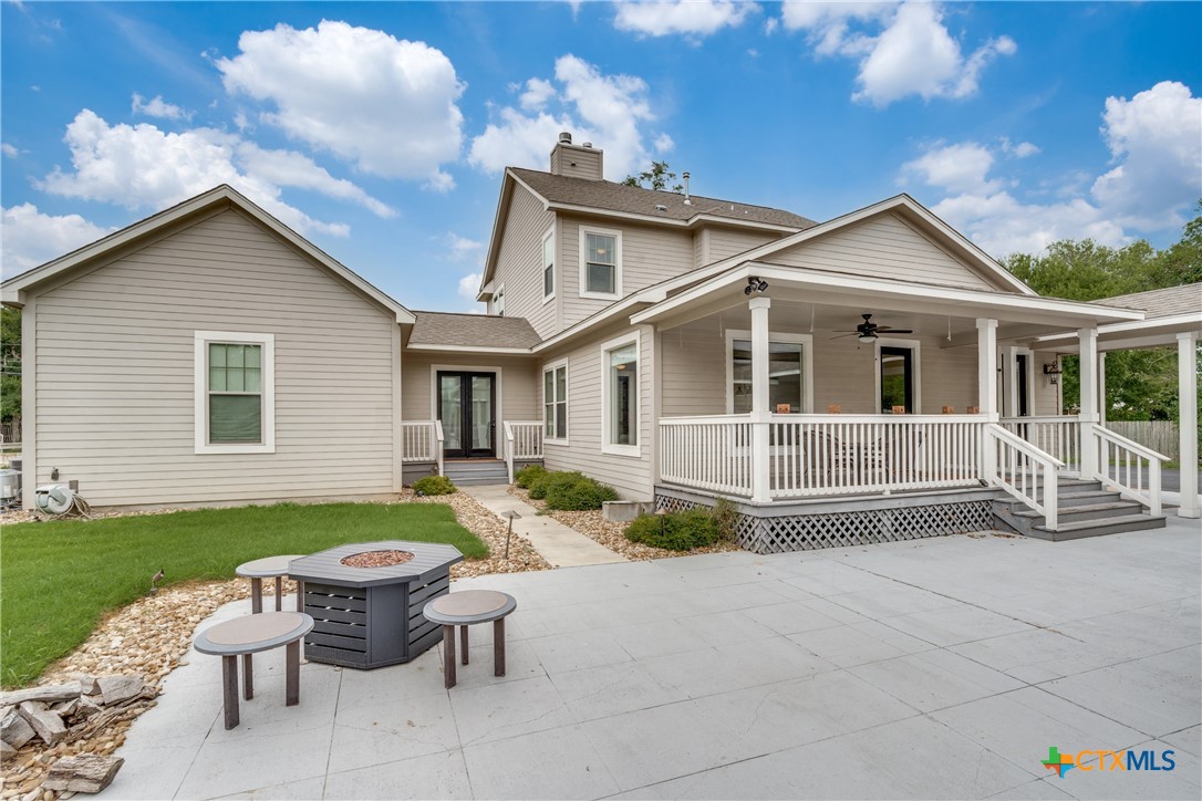 911 Farm Street Bastrop, TX 78602 - Photo 22 of 40 a view of a house with patio