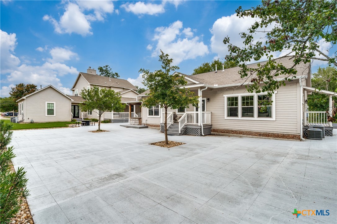 911 Farm Street Bastrop, TX 78602 - Photo 23 of 40 a view of a house with entertaining space